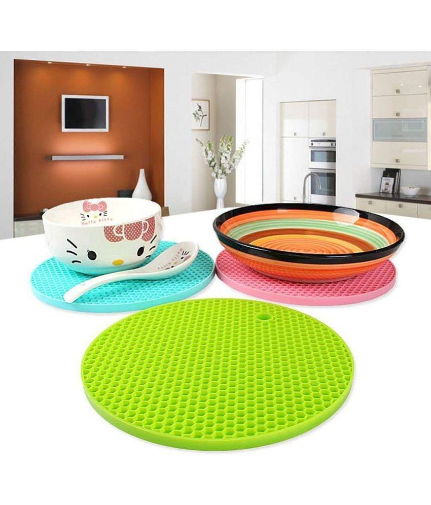 18 ENTERPRISE Trivet Mat Multipurpose Silicone Pot Holders,Anti Slip Hot Pads Silicone Heat Resistant Coasters, Cup Insulation Mat, Insulation Pad Potholders Random Pack of 4.