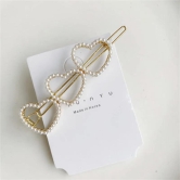 Pearl lined Golden shapes hairclip-Hearts