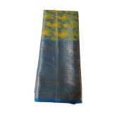 Yellow Tissue Saree With Blue Zari Border