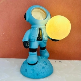 Astronaut Holding Moon-Saffron / Polyresin / H: 13 | L: 7.5 | W: 7 (lnch)