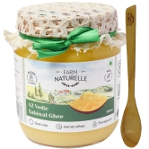 Farm Naturelle-A2 Desi Ghee Cow from Grass Fed Sahiwal Cows | Vedic Bilona Method-Curd Churned-Golden | Grainy & Aromatic, Keto Friendly, Non-GMO | Glass Jar- 500ml+50ml Extra and a Wooden Spoon.