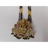 Stunning antique gold plated Goddess Lakshmi earrings with intricate detailing and black beads.