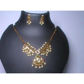 Pearl and gold necklace set with intricate detailing