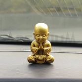 Artarium Resin Baby Monk Statue Idol Showpiece Figurine for Car Dashboard Table Top Home Decoration