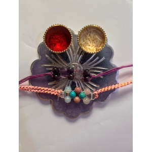 customized-purple-flower-shape-rakhi-pooja-thalli-with-rakhi-fluorite-rakhi