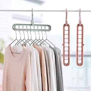 4 Pcs Pack of Multi Hanger Anti-Skid Plastic 360 Degree Swivel Hook, 9-Holes Magic Wardrobe Space Saver Folding Hangers Closet Organiser Wet and Dry Clothes Hanger.