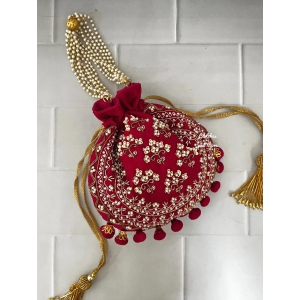 Rani Pink Ball Tassles Potli