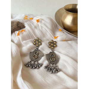 Raksha dual tone earrings with ghunghroo detail