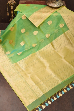 green-and-mustard-dual-tone-exquisite-banarasi-organza-silk-saree-with-zari-motifs-silk-mark-certified