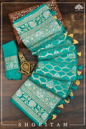 banarasi-silk-georgette-saree-in-alfi-sona-rupa-jaal-weave-in-tiffany-blue-with-stacked-border-silk-mark-certified-sarees-by-shobitam