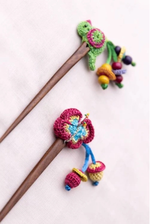 multicoloured-bird-butterfly-hair-stick-pair-green