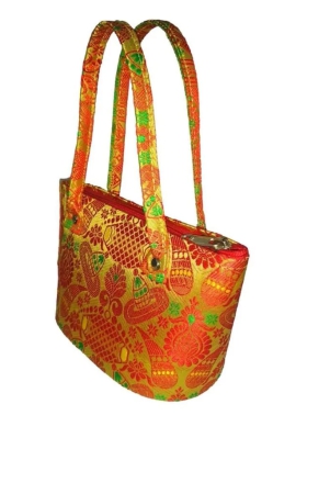 red-and-yellow-brocade-handbag-with-green-handles