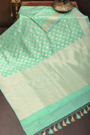 banarasi-katan-silk-saree-in-mint-green-and-gold-with-zari-motifs-silk-mark-certified