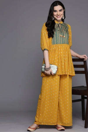 floral-pleated-tie-up-neck-kurti-with-palazzos