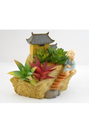 monk-sitting-near-home-resin-succulent-pot