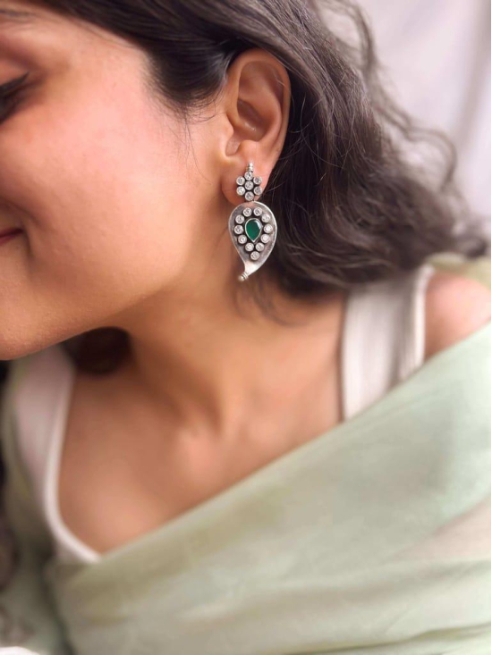 Ambika silver earring with zircon and emerald stone