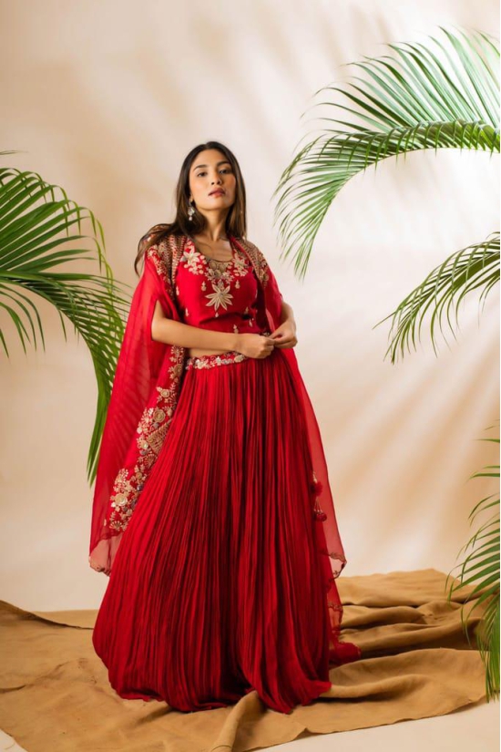 Embroidered Elegance: Anushka Gupta’s Couture Raw Silk Lehenga Set in Red