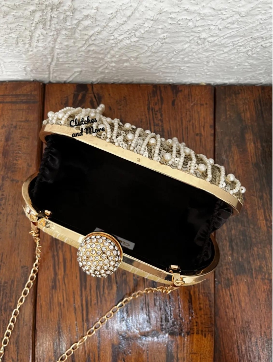 Capsule style silver clutch