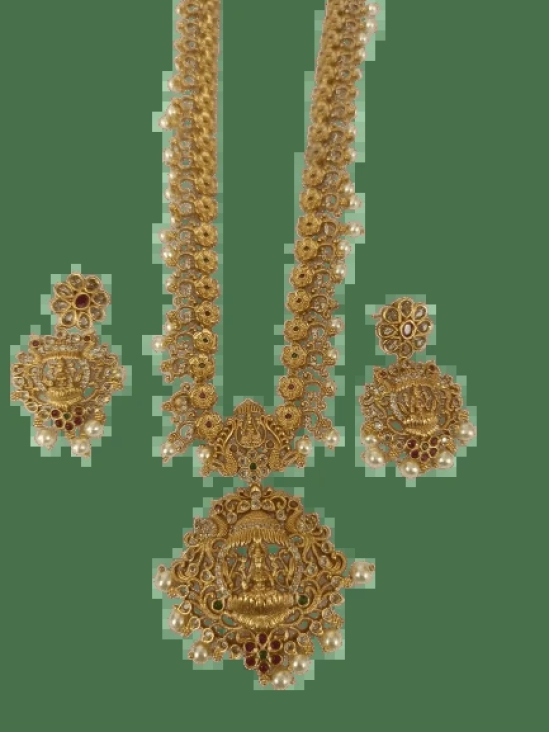 Stunning antique gold plated traditional Indian earrings with intricate detailing and pearl drops.