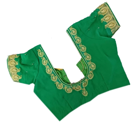 Green blouse with intricate embroidery