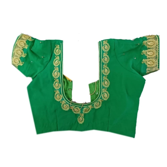 Green blouse with intricate embroidery