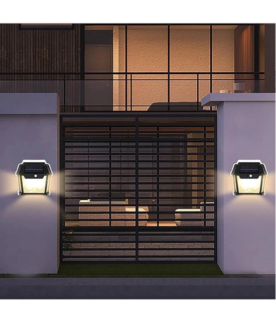 18-ENTERPRISE Outdoor Solar Wall Light with Motion Sensor Wireless Auto Chargeable Dusk to Dawn Exterior Sconce Security Lamps for Front Porch Patio Garden Camping Fence Garage (Warm Light, 