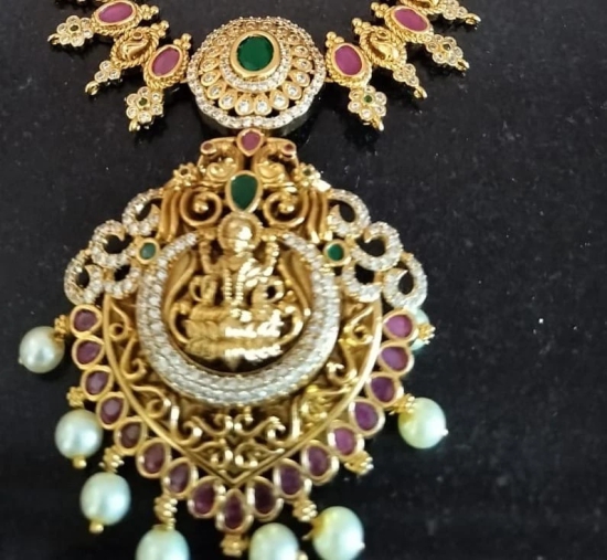 Stunning Lakshmi Pendant Haram Necklace with Ruby Stones and Pearls