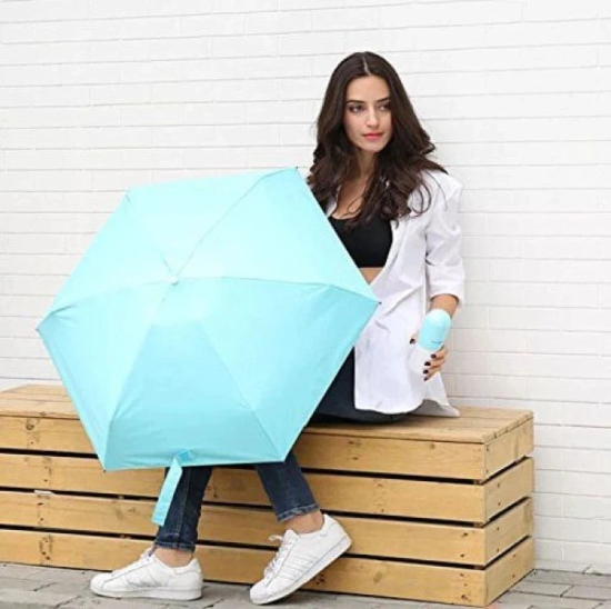 Not Available Designer Ultra Mini UV Coated 4-Fold Travel Capsule Umbrella, (Best for Gifting Purpose and Best fit for Kids) 85 cm Sky Blue - Blue