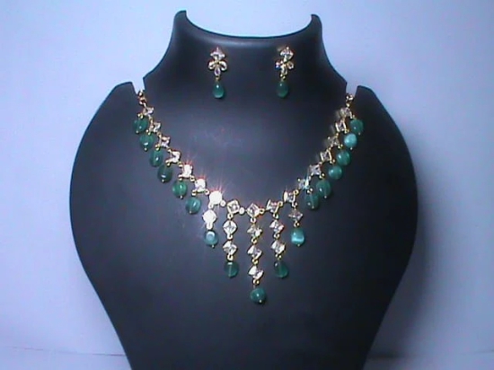 Stunning Emerald and Diamond Necklace Set in 14K White Gold