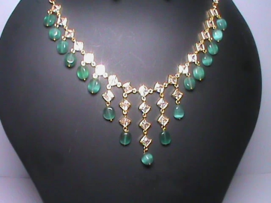 Stunning Emerald and Diamond Necklace Set in 14K White Gold