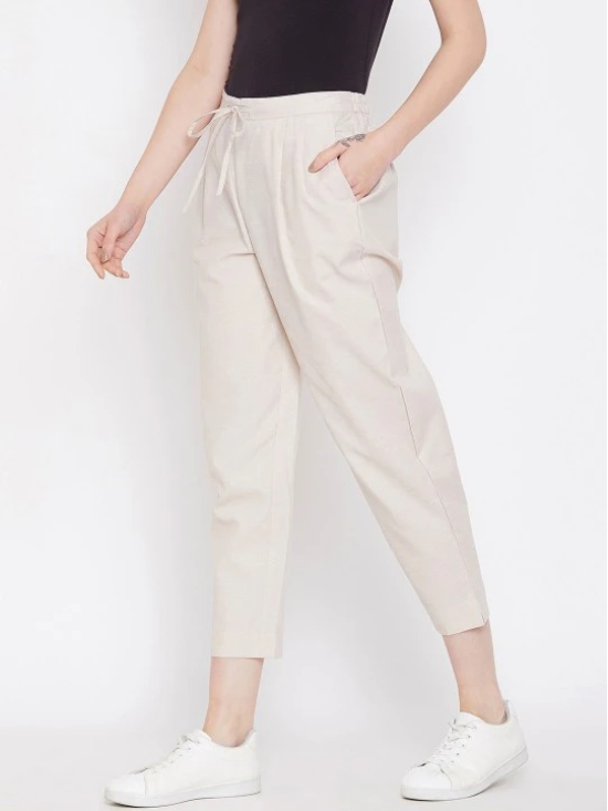 Women Beige Relaxed Regular Fit Self Design Cropped Peg Trousers