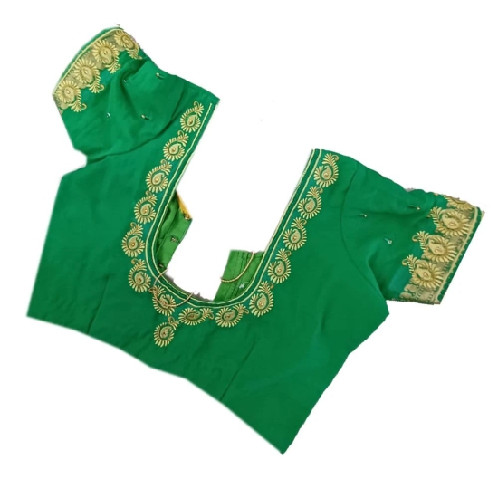 Green blouse with intricate embroidery