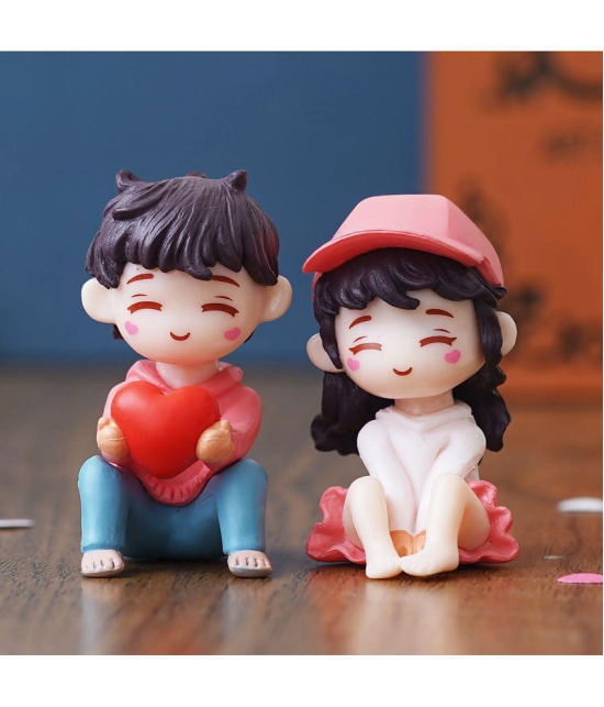 eCraftIndia Multicolor Resin Couple Figurine