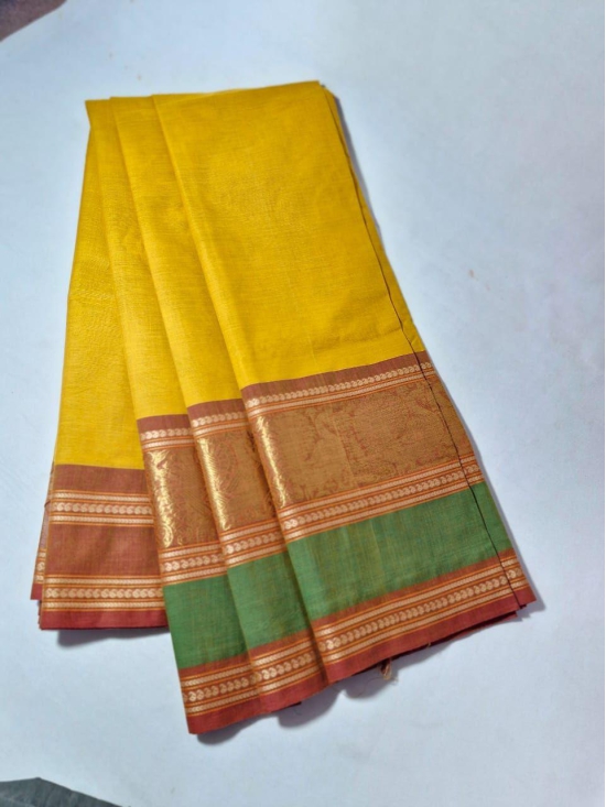 NVKCD001- Yellow color with Brown and Pastel Green Broder Kanchi Cotton  Handoven Saree