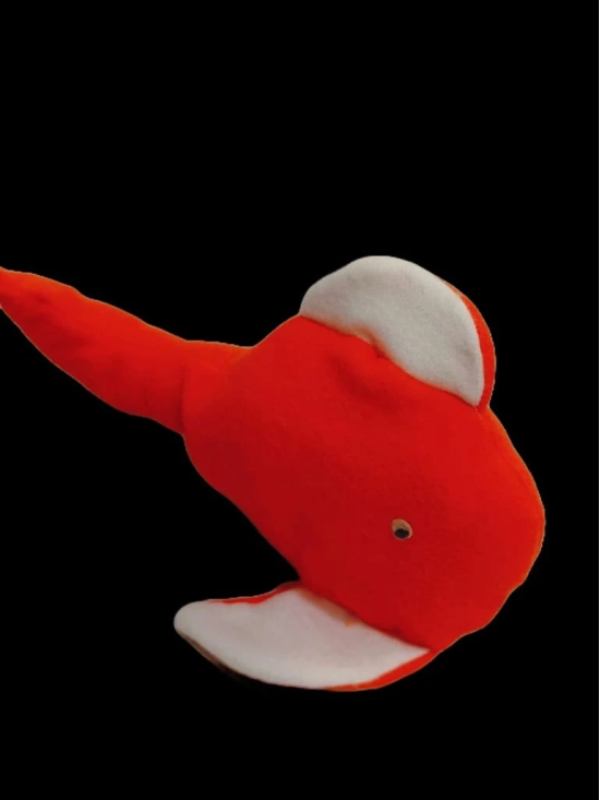 Red plush whale stuffed animal