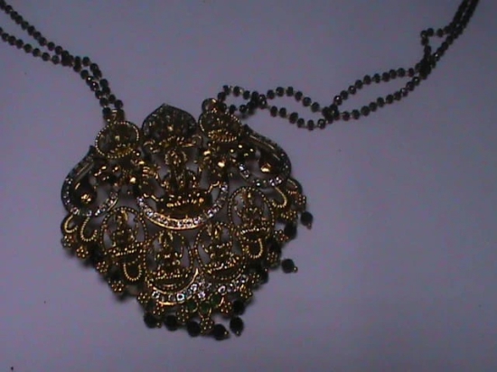 Delicate Gold Pendant on Black Beaded Chain