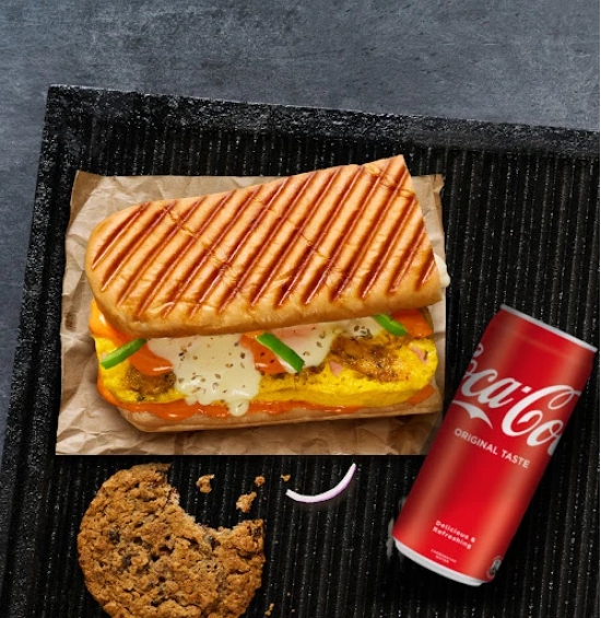 Egg n Cheese Sandwich + Side + Coke