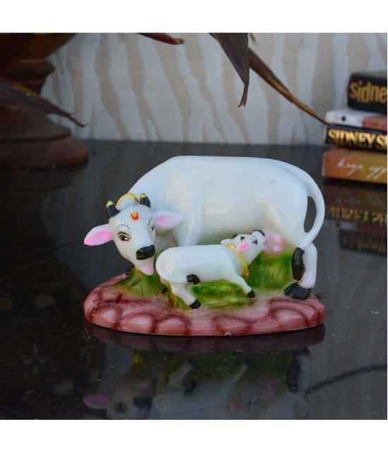 PAYSTORE -Polyresin Kamdhenu Cow Religious Showpiece ( Pack of 1 )