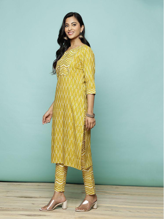 Rangita Women Cotton Mustard Sequined Calf Length Straight Kurti With Pants - None