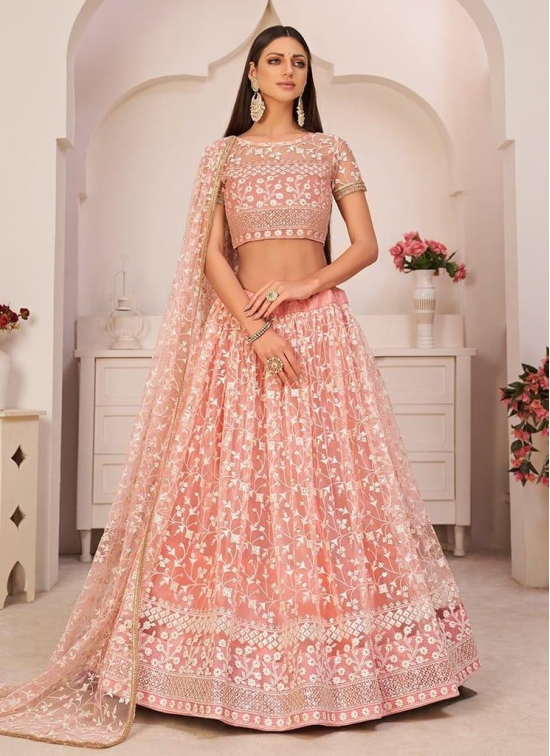 Gorgeous Peach Mono Net Wedding Wear Lehenga Choli