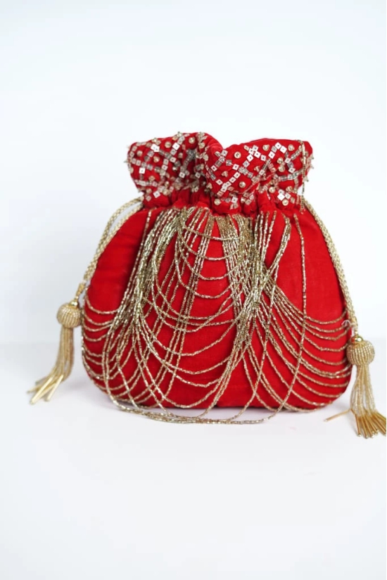 Embellished Red velvet with golden color embroidered potli bag