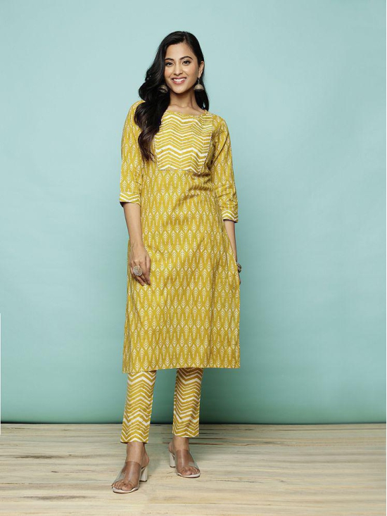 Rangita Women Cotton Mustard Sequined Calf Length Straight Kurti With Pants - None