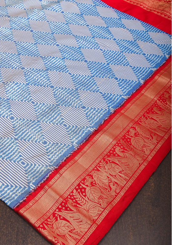 Blue and White Base Ikkat Optical Illusion Design Patola with Kanjivaram Pure Silk Fusion Saree and contrast Red Border | SILK MARK CERTIFIED