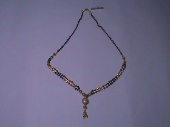 Gold Mangalsutra with Black Beads