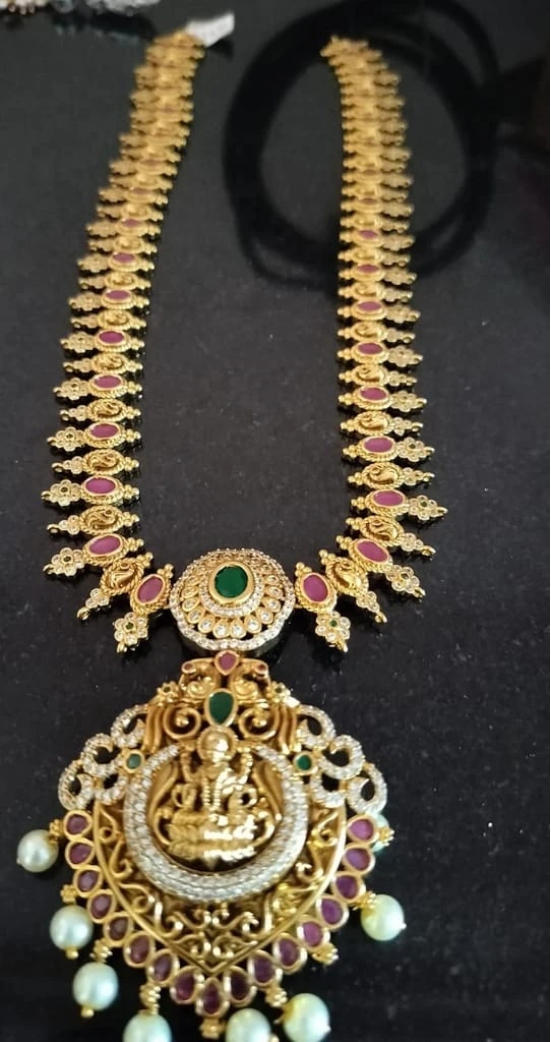 Stunning Lakshmi Pendant Haram Necklace with Ruby Stones and Pearls