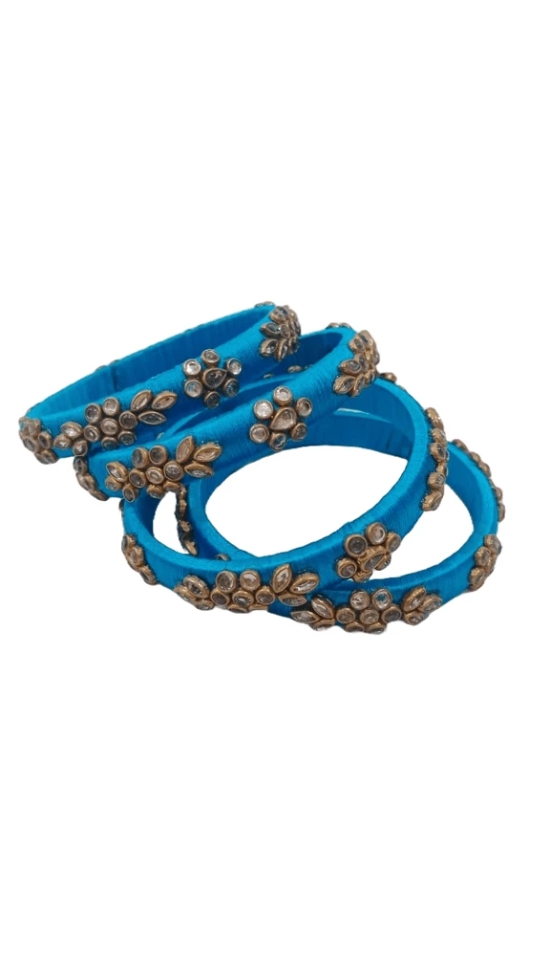 Set of 4 Blue Silk Thread Bangles with Stone and Pearl Embellishment