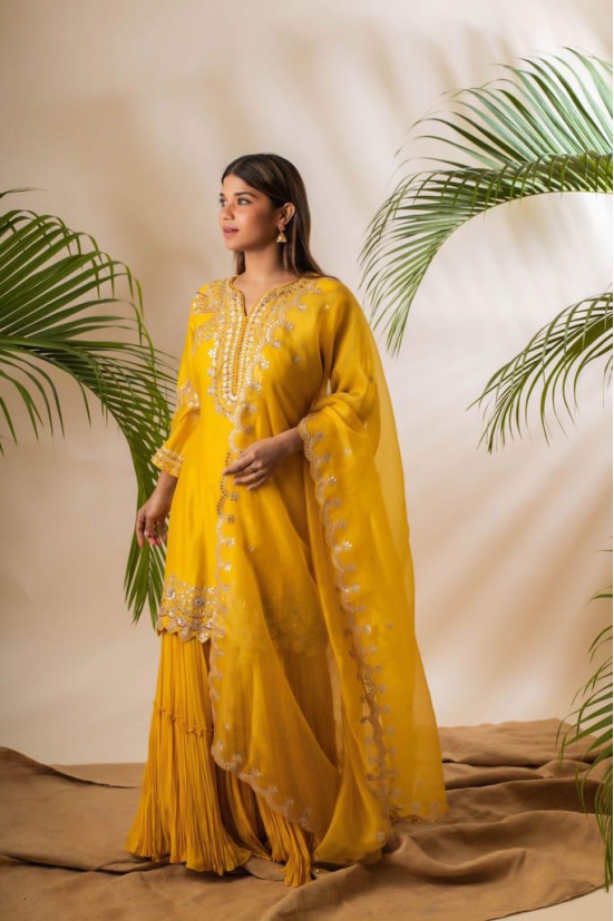 Ethnic Charm: Anushka Gupta’s Yellow Handloom Cotton Kurta Sharara Set with Intricate Embroidery